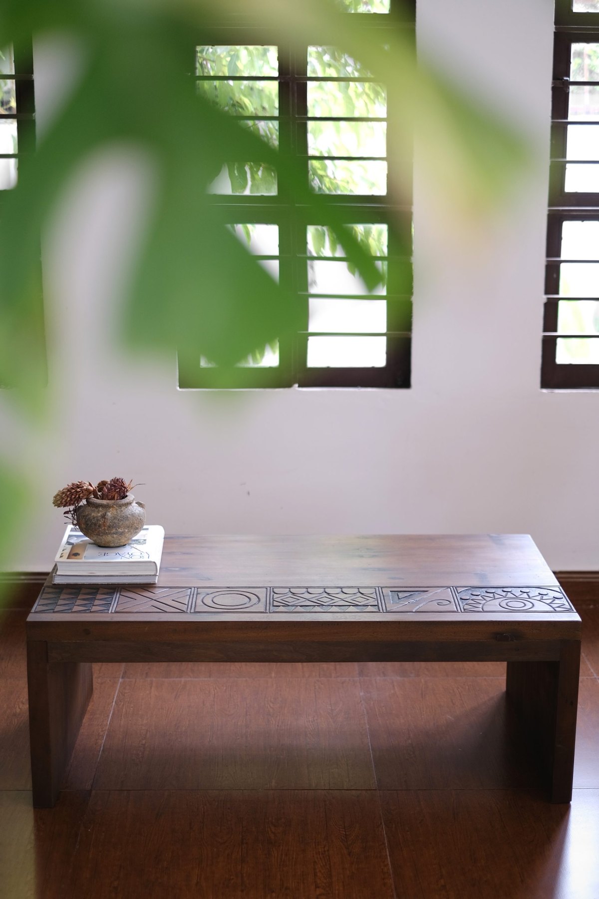 Carved Coffee Table with Integrated Legs
